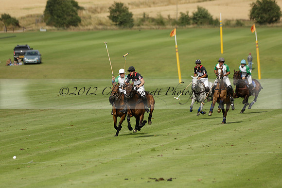 Jaeger Le Coultre (black)  v Wairakei Pastoral (white) in a Jaeger Le Coultre Holden White Cup polo match played on 29 July 2013 at Cowdray Park Polo Club on Brooksfieldwww.polopictures.co.uk