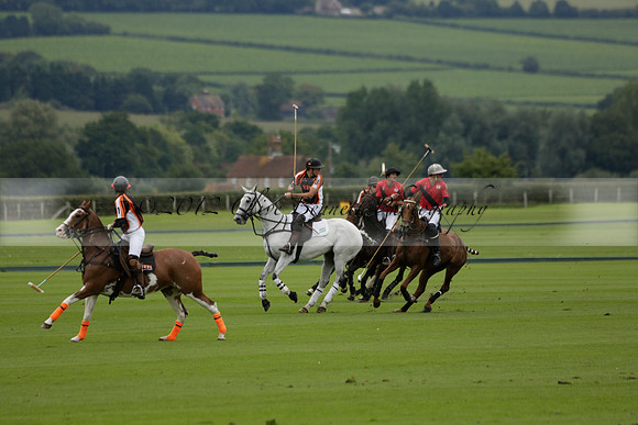 Four Quarters Black (black) v Clashleigh (red) in the Autumn Cup subsidiary final polo match on Ambersham 2 at Cowdray Park Polo Club on Sunday 22 September 2013 www.polopictures.co.uk