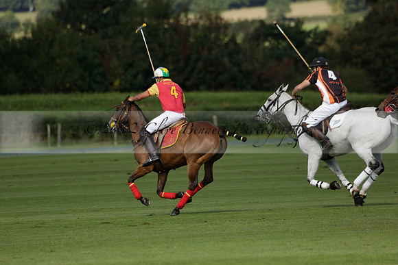 Four Quarters Black (black) v BHC (red) in a Autumn Cup polo match on Ambersham 2 at Cowdray Park Polo Club on Friday 20 September 2013 www.polopictures.co.uk