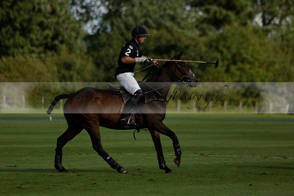 Aryana (black) v Shoreline (yellow) in a Farewell Cup polo match played on Ambersham 5 at Cowdray Park Polo Club on Wednesday 18 September 2013. www.polopictures.co.uk