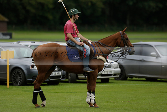 Four Quarters Black (black) v Clashleigh (red) in the Autumn Cup subsidiary final polo match on Ambersham 2 at Cowdray Park Polo Club on Sunday 22 September 2013 www.polopictures.co.uk