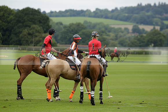 Four Quarters Black (black) v Clashleigh (red) in the Autumn Cup subsidiary final polo match on Ambersham 2 at Cowdray Park Polo Club on Sunday 22 September 2013 www.polopictures.co.uk