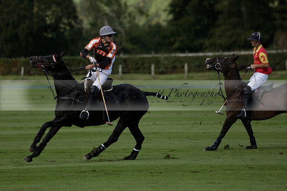 Four Quarters Black (black) v BHC (red) in a Autumn Cup polo match on Ambersham 2 at Cowdray Park Polo Club on Friday 20 September 2013 www.polopictures.co.uk