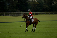 Four Quarters Black (black) v Clashleigh (red)in a Jaeger Le Coultre Autumn Cup polo match played on Ambersham 2 at Cowdray Park Polo Club on Wednesday 2013.09.11 www.polopictures.co.uk