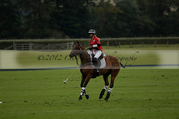Four Quarters Black (black) v Clashleigh (red)in a Jaeger Le Coultre Autumn Cup polo match played on Ambersham 2 at Cowdray Park Polo Club on Wednesday 2013.09.11 www.polopictures.co.uk