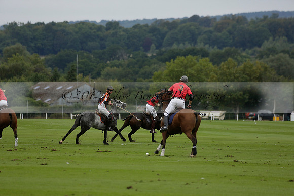 Four Quarters Black (black) v Clashleigh (red) in the Autumn Cup subsidiary final polo match on Ambersham 2 at Cowdray Park Polo Club on Sunday 22 September 2013 www.polopictures.co.uk