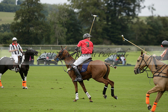 Four Quarters Black (black) v Clashleigh (red) in the Autumn Cup subsidiary final polo match on Ambersham 2 at Cowdray Park Polo Club on Sunday 22 September 2013 www.polopictures.co.uk