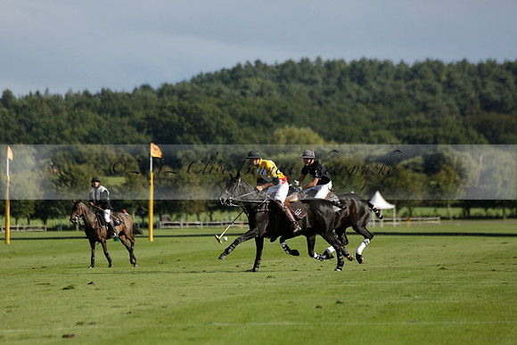 Aryana (black) v Shoreline (yellow) in a Farewell Cup polo match played on Ambersham 5 at Cowdray Park Polo Club on Wednesday 18 September 2013. www.polopictures.co.uk