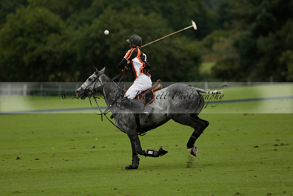 Four Quarters Black (black) v Clashleigh (red) in the Autumn Cup subsidiary final polo match on Ambersham 2 at Cowdray Park Polo Club on Sunday 22 September 2013 www.polopictures.co.uk