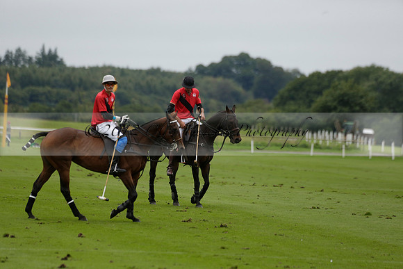 Four Quarters Black (black) v Clashleigh (red) in the Autumn Cup subsidiary final polo match on Ambersham 2 at Cowdray Park Polo Club on Sunday 22 September 2013 www.polopictures.co.uk