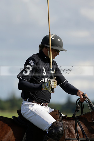 Aryana (black) v Shoreline (yellow) in a Farewell Cup polo match played on Ambersham 5 at Cowdray Park Polo Club on Wednesday 18 September 2013. www.polopictures.co.uk