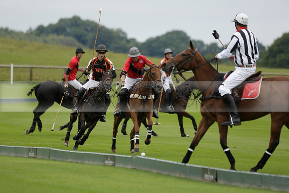 Four Quarters Black (black) v Clashleigh (red) in the Autumn Cup subsidiary final polo match on Ambersham 2 at Cowdray Park Polo Club on Sunday 22 September 2013 www.polopictures.co.uk