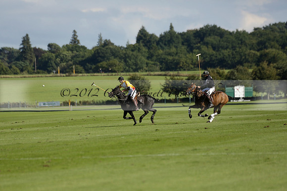 Aryana (black) v Shoreline (yellow) in a Farewell Cup polo match played on Ambersham 5 at Cowdray Park Polo Club on Wednesday 18 September 2013. www.polopictures.co.uk