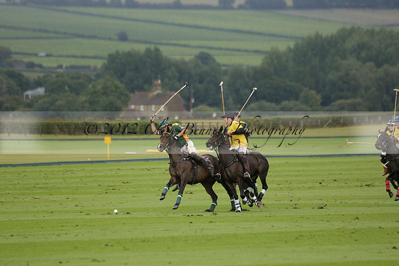 Maiz Dulce (green) v Las Esterellas (yellow) in the PSI Final polo match at Cowdray Park Polo Club on Ambersham 2 on Sunday 2013.09.08 www.polopictures.co.uk