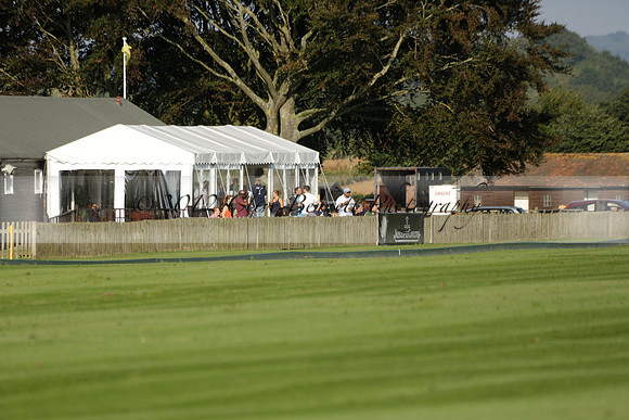 Pluma Negra (white) v Shoreline (black) in the Brecknock Cup Subsidiary final polo match played on Sunday 25 August 2013 at Cowdray Park Polo Club on Ambersham 1. 2013.10.12 www.polopictures.co.uk