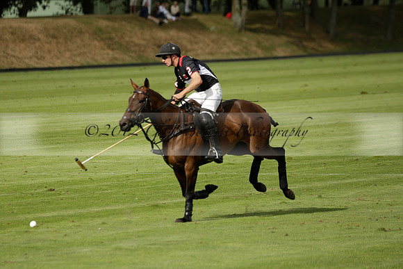 Jaeger Le Coultre (black)  v Wairakei Pastoral (white) in a Jaeger Le Coultre Holden White Cup polo match played on 29 July 2013 at Cowdray Park Polo Club on Brooksfieldwww.polopictures.co.uk