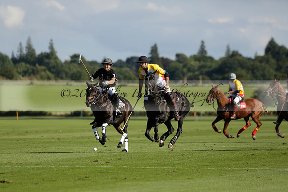 Aryana (black) v Shoreline (yellow) in a Farewell Cup polo match played on Ambersham 5 at Cowdray Park Polo Club on Wednesday 18 September 2013. www.polopictures.co.uk