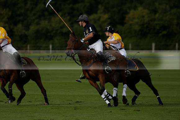 Aryana (black) v Shoreline (yellow) in a Farewell Cup polo match played on Ambersham 5 at Cowdray Park Polo Club on Wednesday 18 September 2013. www.polopictures.co.uk