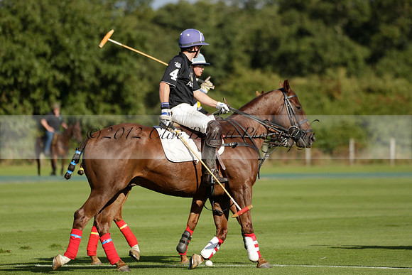 Aryana (black) v Shoreline (yellow) in a Farewell Cup polo match played on Ambersham 5 at Cowdray Park Polo Club on Wednesday 18 September 2013. www.polopictures.co.uk