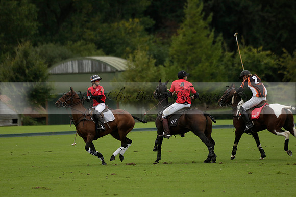 Four Quarters Black (black) v Clashleigh (red) in the Autumn Cup subsidiary final polo match on Ambersham 2 at Cowdray Park Polo Club on Sunday 22 September 2013 www.polopictures.co.uk