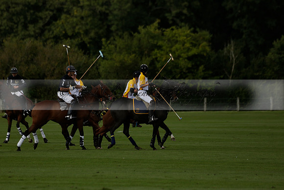 Aryana (black) v Shoreline (yellow) in a Farewell Cup polo match played on Ambersham 5 at Cowdray Park Polo Club on Wednesday 18 September 2013. www.polopictures.co.uk