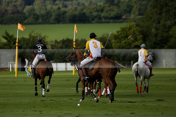 Aryana (black) v Shoreline (yellow) in a Farewell Cup polo match played on Ambersham 5 at Cowdray Park Polo Club on Wednesday 18 September 2013. www.polopictures.co.uk