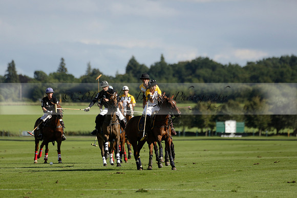 Aryana (black) v Shoreline (yellow) in a Farewell Cup polo match played on Ambersham 5 at Cowdray Park Polo Club on Wednesday 18 September 2013. www.polopictures.co.uk