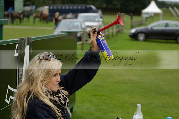 Four Quarters Black (black) v Clashleigh (red) in the Autumn Cup subsidiary final polo match on Ambersham 2 at Cowdray Park Polo Club on Sunday 22 September 2013 www.polopictures.co.uk