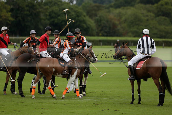 Four Quarters Black (black) v Clashleigh (red) in the Autumn Cup subsidiary final polo match on Ambersham 2 at Cowdray Park Polo Club on Sunday 22 September 2013 www.polopictures.co.uk