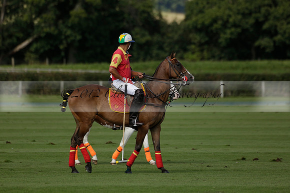Four Quarters Black (black) v BHC (red) in a Autumn Cup polo match on Ambersham 2 at Cowdray Park Polo Club on Friday 20 September 2013 www.polopictures.co.uk