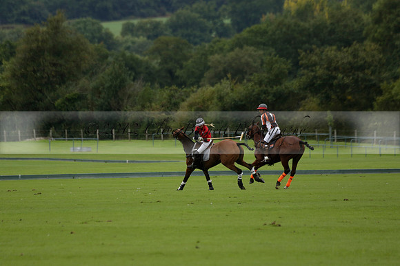 Four Quarters Black (black) v Clashleigh (red) in the Autumn Cup subsidiary final polo match on Ambersham 2 at Cowdray Park Polo Club on Sunday 22 September 2013 www.polopictures.co.uk