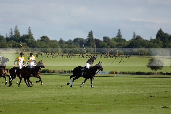 Aryana (black) v Shoreline (yellow) in a Farewell Cup polo match played on Ambersham 5 at Cowdray Park Polo Club on Wednesday 18 September 2013. www.polopictures.co.uk