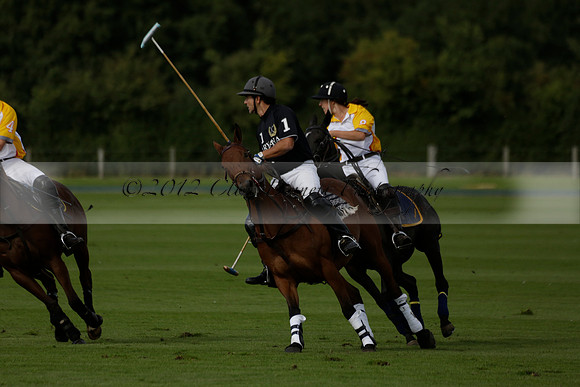 Aryana (black) v Shoreline (yellow) in a Farewell Cup polo match played on Ambersham 5 at Cowdray Park Polo Club on Wednesday 18 September 2013. www.polopictures.co.uk