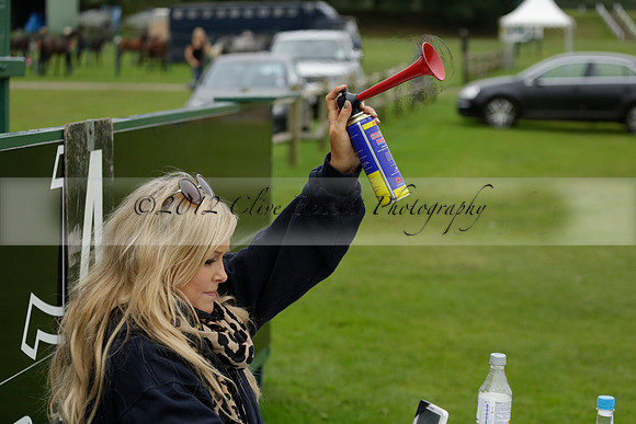 Four Quarters Black (black) v Clashleigh (red) in the Autumn Cup subsidiary final polo match on Ambersham 2 at Cowdray Park Polo Club on Sunday 22 September 2013 www.polopictures.co.uk