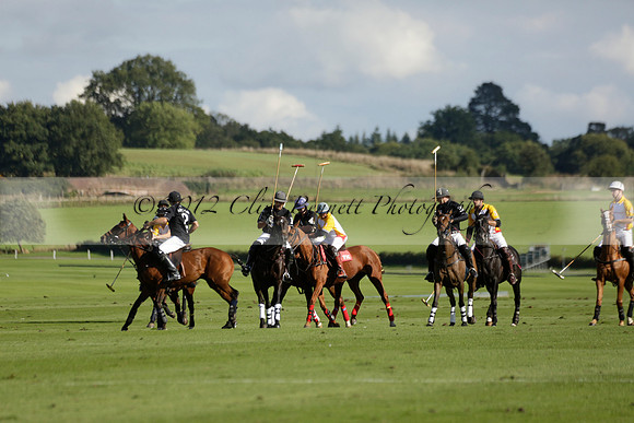 Aryana (black) v Shoreline (yellow) in a Farewell Cup polo match played on Ambersham 5 at Cowdray Park Polo Club on Wednesday 18 September 2013. www.polopictures.co.uk