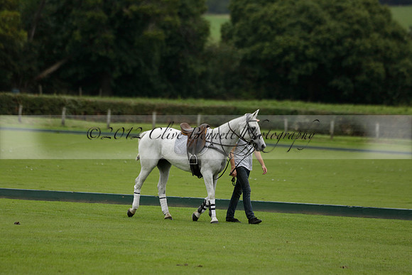 Four Quarters Black (black) v Clashleigh (red) in the Autumn Cup subsidiary final polo match on Ambersham 2 at Cowdray Park Polo Club on Sunday 22 September 2013 www.polopictures.co.uk
