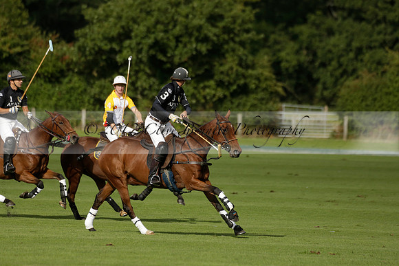 Aryana (black) v Shoreline (yellow) in a Farewell Cup polo match played on Ambersham 5 at Cowdray Park Polo Club on Wednesday 18 September 2013. www.polopictures.co.uk