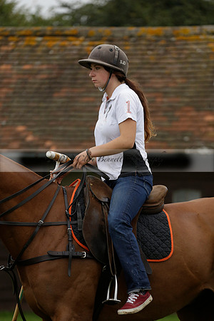 Four Quarters Black (black) v Clashleigh (red) in the Autumn Cup subsidiary final polo match on Ambersham 2 at Cowdray Park Polo Club on Sunday 22 September 2013 www.polopictures.co.uk