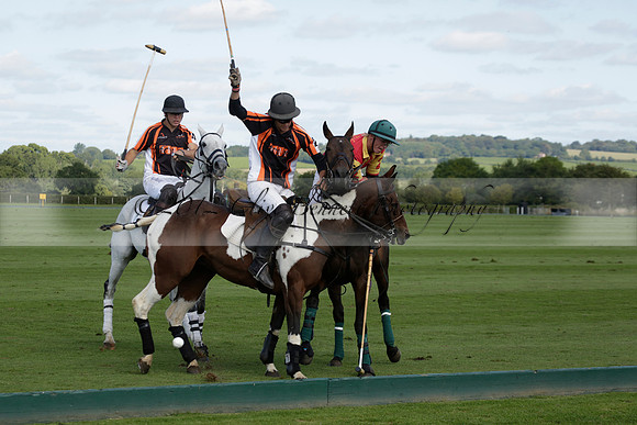 Four Quarters Black (black) v BHC (red) in a Autumn Cup polo match on Ambersham 2 at Cowdray Park Polo Club on Friday 20 September 2013 www.polopictures.co.uk