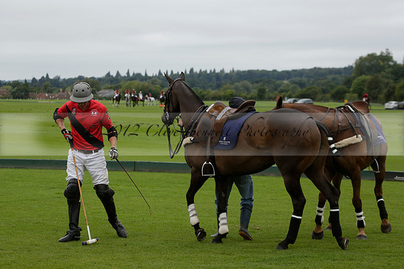 Four Quarters Black (black) v Clashleigh (red) in the Autumn Cup subsidiary final polo match on Ambersham 2 at Cowdray Park Polo Club on Sunday 22 September 2013 www.polopictures.co.uk