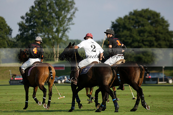 Pluma Negra (white) v Shoreline (black) in the Brecknock Cup Subsidiary final polo match played on Sunday 25 August 2013 at Cowdray Park Polo Club on Ambersham 1. 2013.10.12 www.polopictures.co.uk