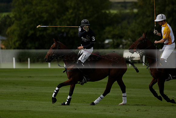 Aryana (black) v Shoreline (yellow) in a Farewell Cup polo match played on Ambersham 5 at Cowdray Park Polo Club on Wednesday 18 September 2013. www.polopictures.co.uk