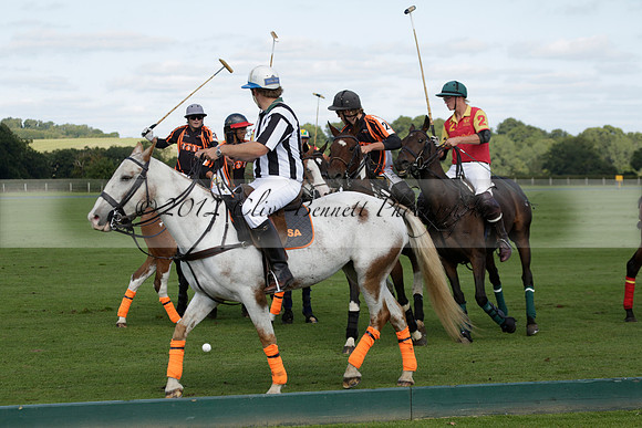 Four Quarters Black (black) v BHC (red) in a Autumn Cup polo match on Ambersham 2 at Cowdray Park Polo Club on Friday 20 September 2013 www.polopictures.co.uk