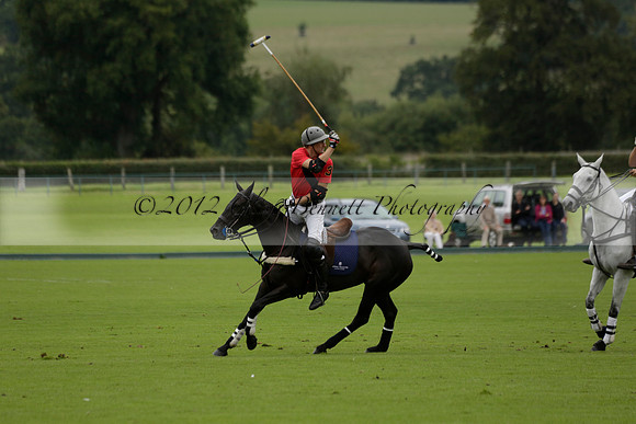 Four Quarters Black (black) v Clashleigh (red) in the Autumn Cup subsidiary final polo match on Ambersham 2 at Cowdray Park Polo Club on Sunday 22 September 2013 www.polopictures.co.uk