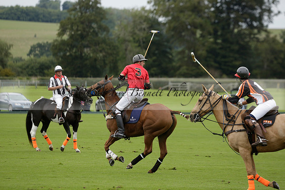 Four Quarters Black (black) v Clashleigh (red) in the Autumn Cup subsidiary final polo match on Ambersham 2 at Cowdray Park Polo Club on Sunday 22 September 2013 www.polopictures.co.uk