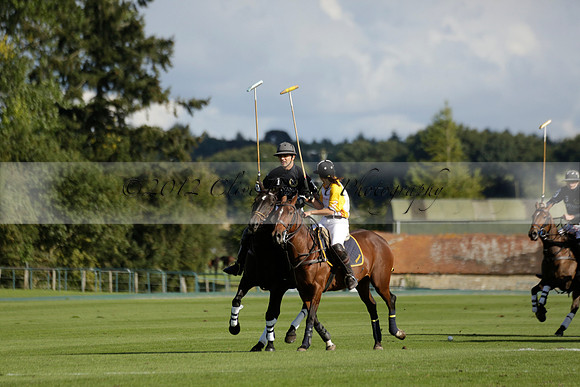 Aryana (black) v Shoreline (yellow) in a Farewell Cup polo match played on Ambersham 5 at Cowdray Park Polo Club on Wednesday 18 September 2013. www.polopictures.co.uk