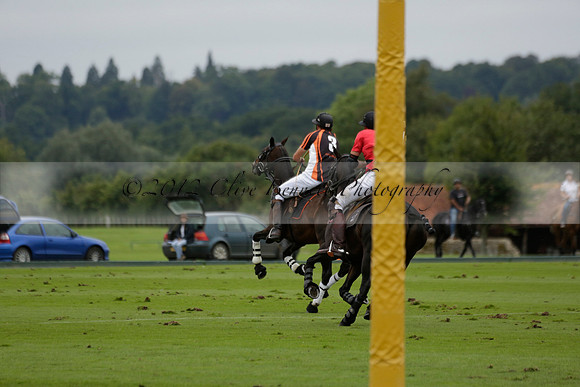 Four Quarters Black (black) v Clashleigh (red) in the Autumn Cup subsidiary final polo match on Ambersham 2 at Cowdray Park Polo Club on Sunday 22 September 2013 www.polopictures.co.uk
