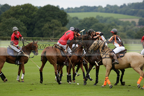 Four Quarters Black (black) v Clashleigh (red) in the Autumn Cup subsidiary final polo match on Ambersham 2 at Cowdray Park Polo Club on Sunday 22 September 2013 www.polopictures.co.uk