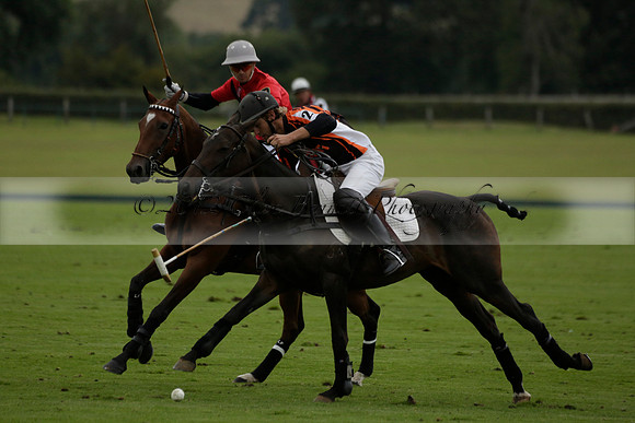 Four Quarters Black (black) v Clashleigh (red)in a Jaeger Le Coultre Autumn Cup polo match played on Ambersham 2 at Cowdray Park Polo Club on Wednesday 2013.09.11 www.polopictures.co.uk