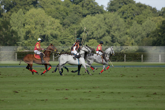 Four Quarters Black (black) v BHC (red) in a Autumn Cup polo match on Ambersham 2 at Cowdray Park Polo Club on Friday 20 September 2013 www.polopictures.co.uk